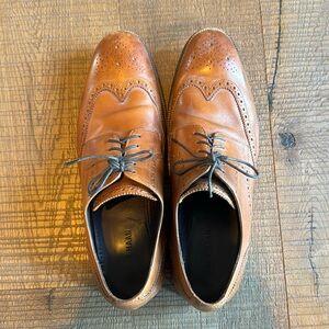 Cole Haan men’s brown dress shoes.